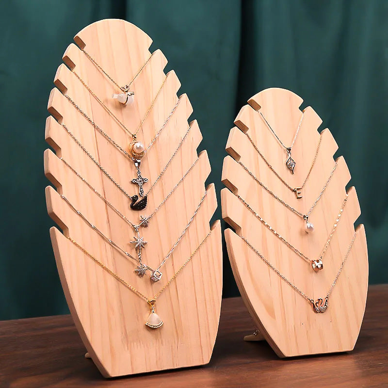 Les deux modèles de Porte-Colliers en Bois côte à côte